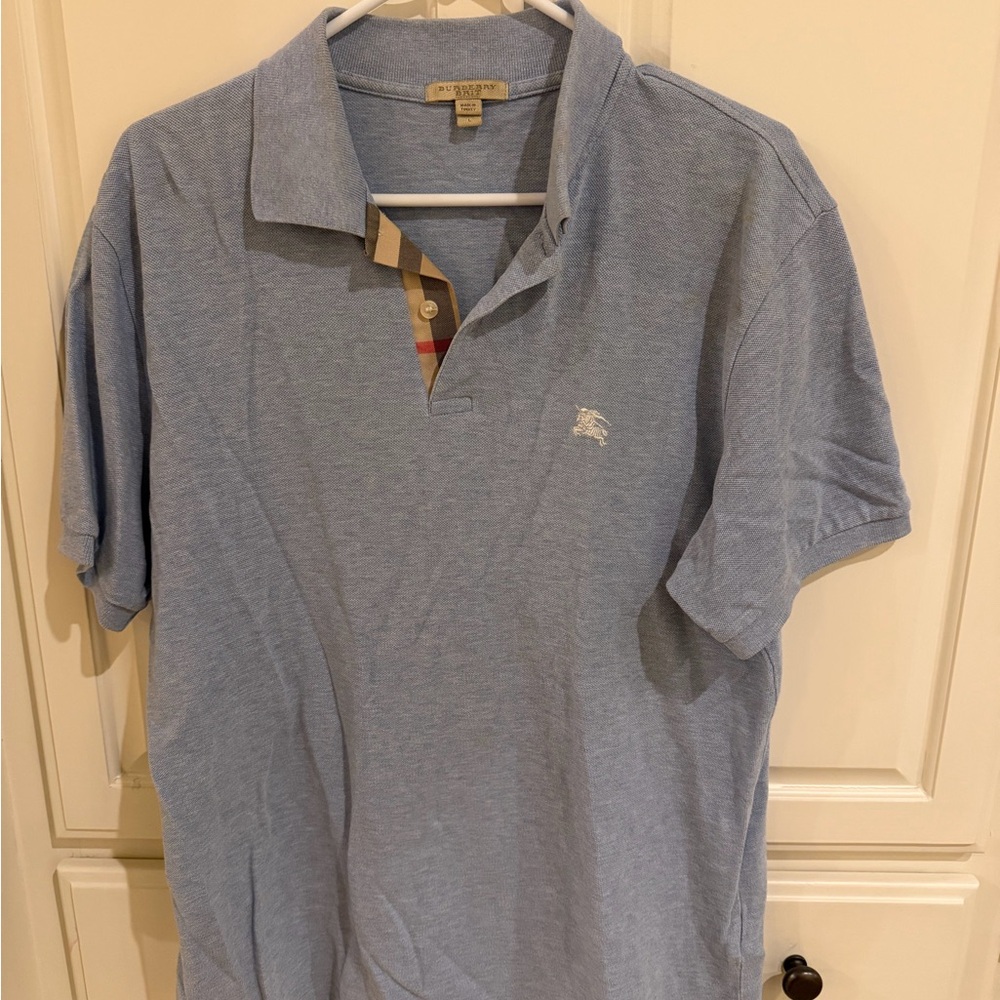 Guaranteed authentic men’s Burberry Light Blue Polo Shirt